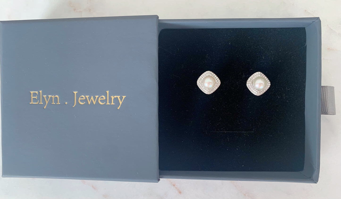 ANGEL EYE STUD EARRINGS